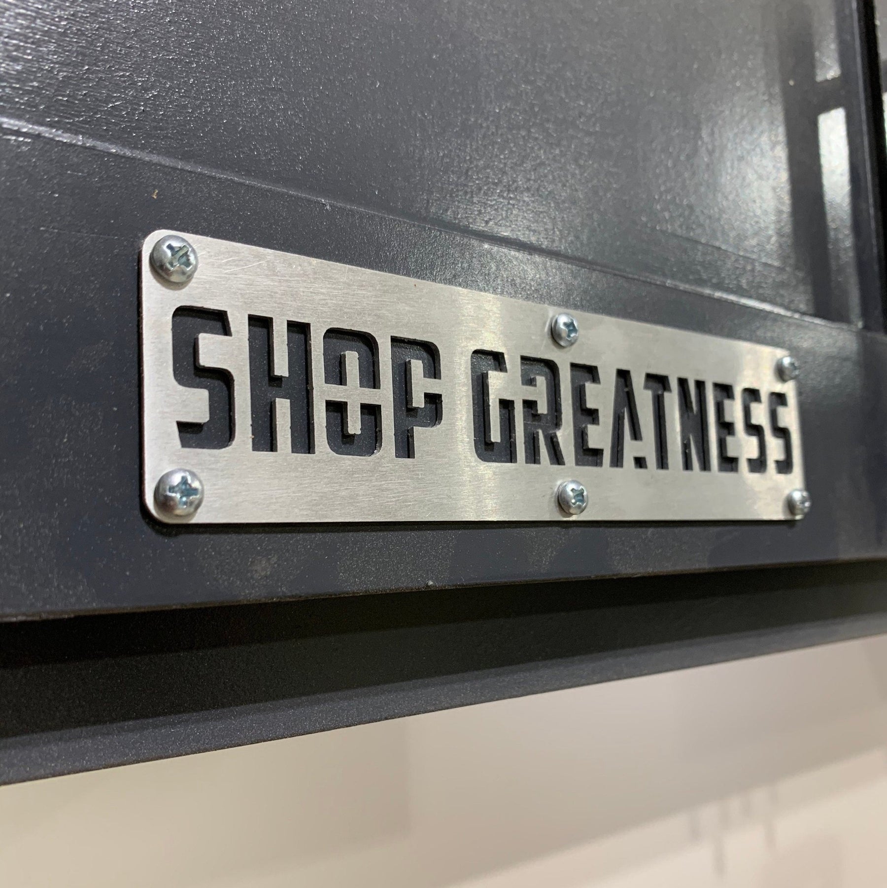 Official “Shop Greatness” Metal Plate - Shop Nation Store