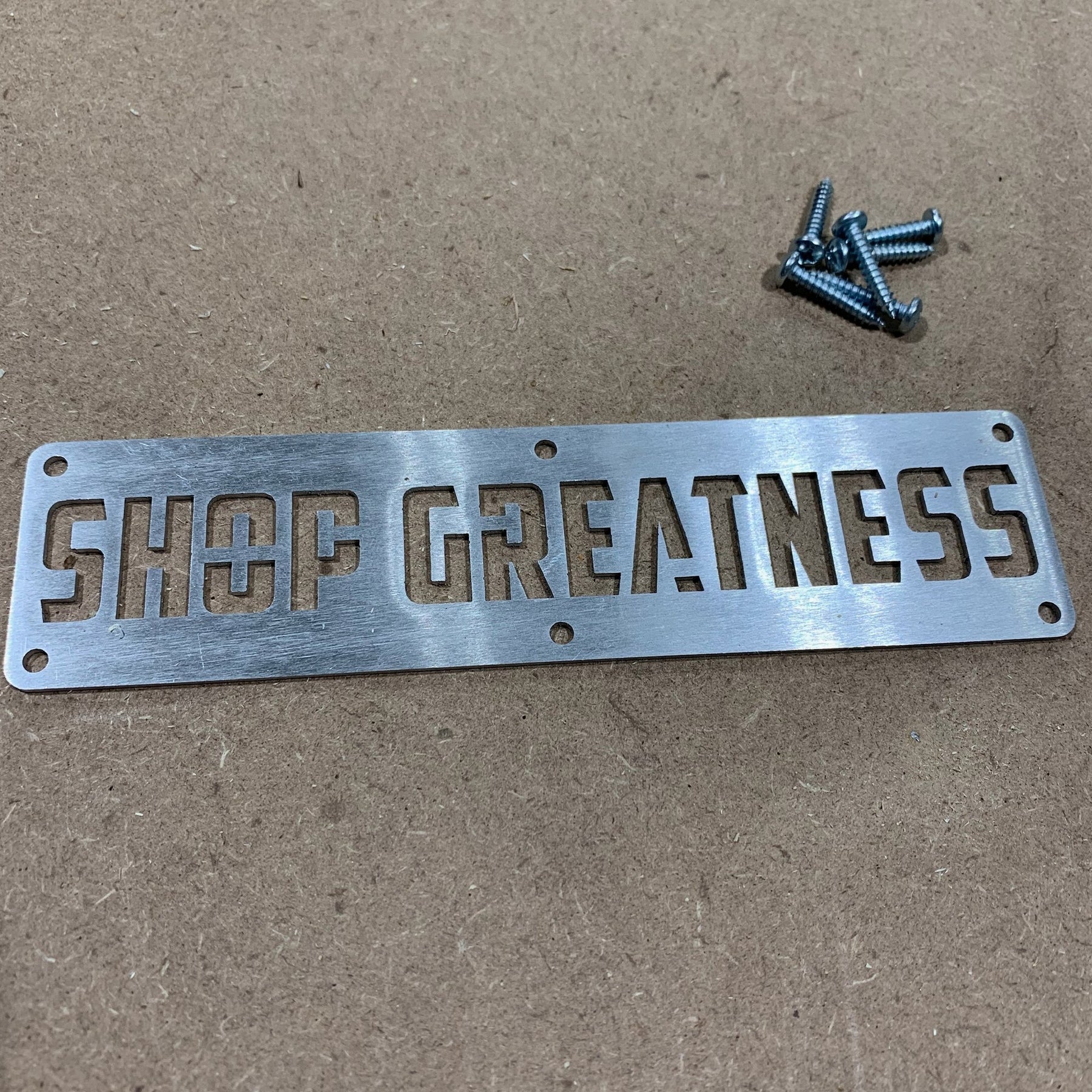 Official “Shop Greatness” Metal Plate - Shop Nation Store